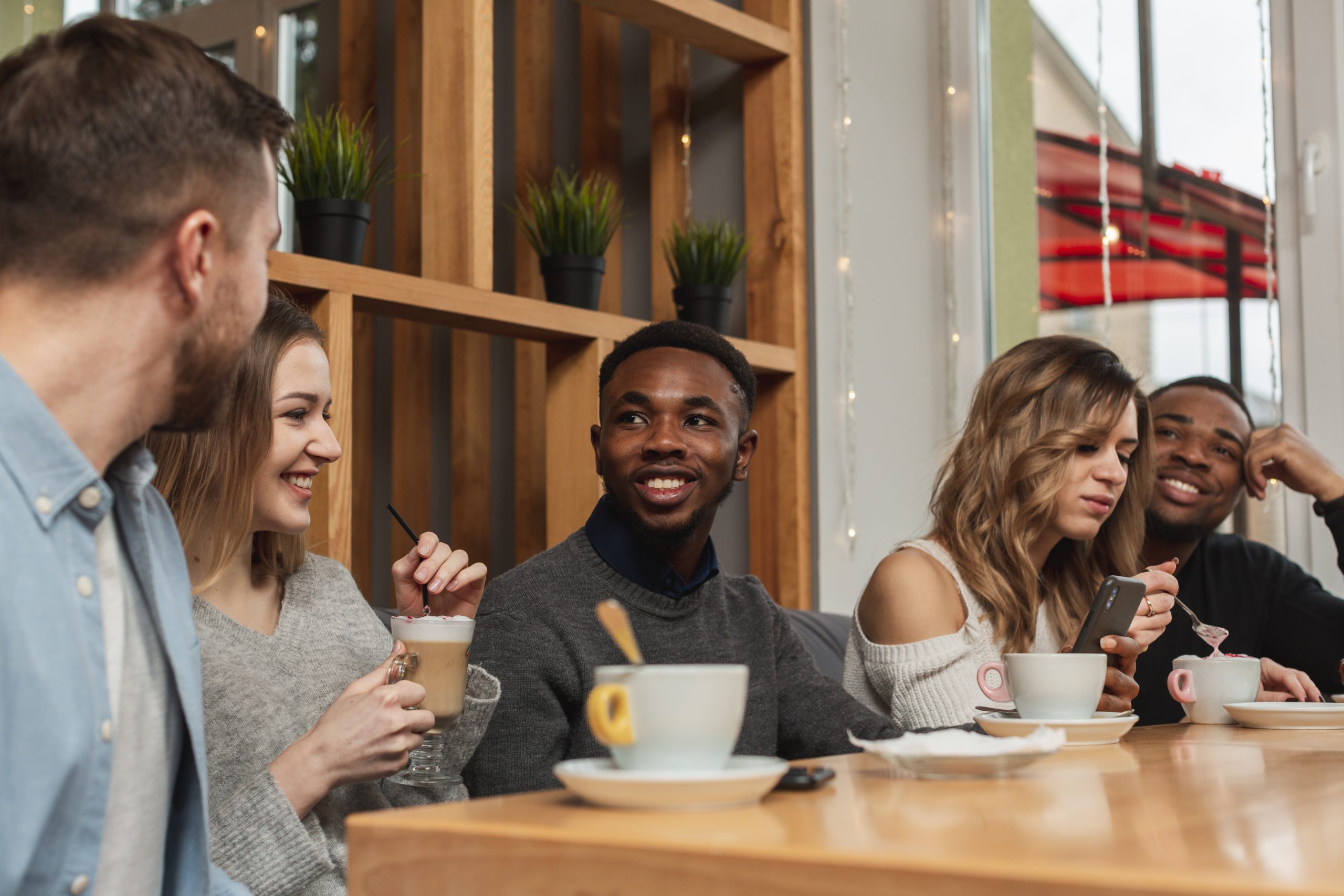 smiley-friends-enjoying-cup-coffee